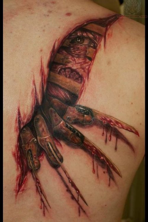 Ripped Skin Freddy Krueger Claw Tattoo